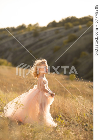 Portrait of a beautiful little princess girl in a Portrait of a beautiful little princess girl in a 57748288