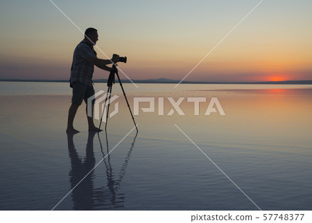 Sunset, lake and photgrapher 57748377