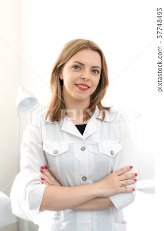 Portrait of a young smiling beautiful girl of a Portrait of a young smiling beautiful girl of a 57748495