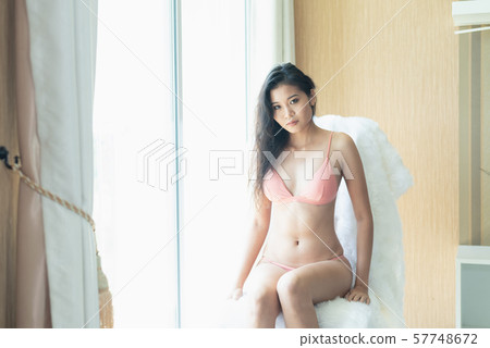 Portrait of sexy young woman model wearing bikini 57748672