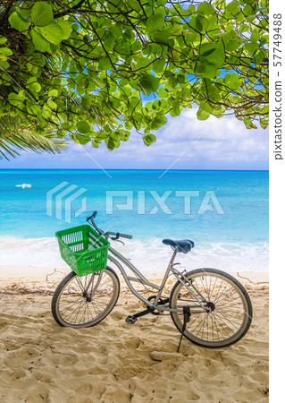 Lonely vintage bicycle on the tropical sandy beach Lonely vintage bicycle on the tropical sandy beach 57749488