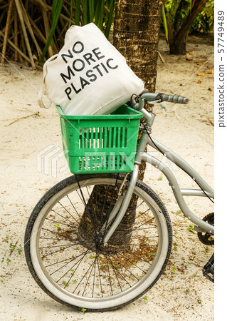 No More Plastic eco bag on bicycle basket No More Plastic eco bag on bicycle basket 57749489