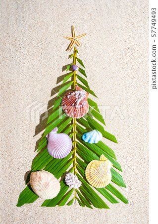 Christmas tree made of green palm thee brunch Christmas tree made of green palm thee brunch 57749493