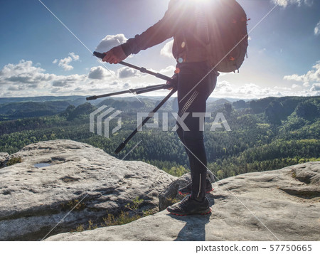 Tourist hiking mountain trail, walking on hill Tourist hiking mountain trail, walking on hill 57750665