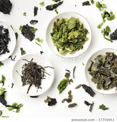 Various dry seaweed, sea vegetables, square overhead shot on a white background Various dry seaweed, sea vegetables, square overhead shot on a white background 57750951
