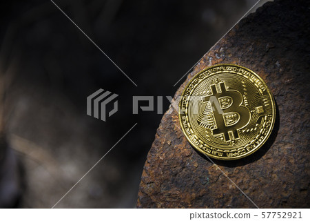 Gold coin Bitcoin on the background of iron rust 57752921
