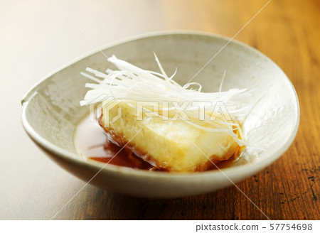 Deep-fried tofu with white hair onion Deep-fried tofu with white hair onion 57754698