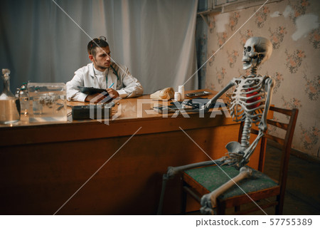 Psychiatrist and patient skeleton, mental hospital 57755389