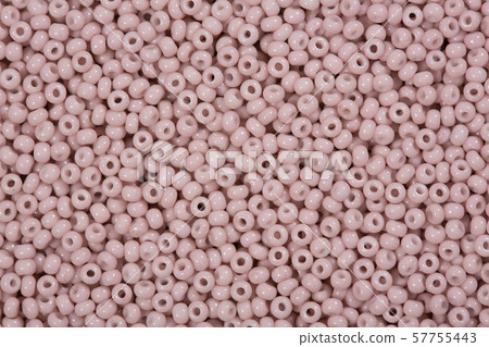 Background of violet seed beads close up. 57755443
