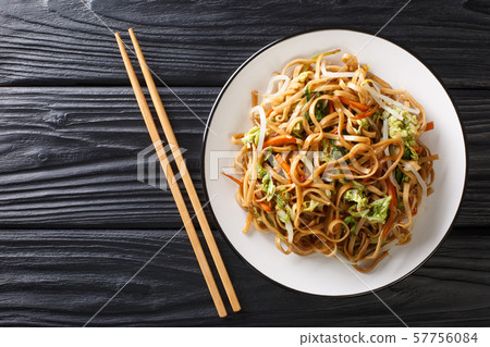 Classic Chinese fried chow mein noodles with Classic Chinese fried chow mein noodles with 57756084