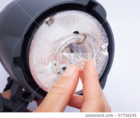replacement of a bulb on a pulsed studio lamp replacement of a bulb on a pulsed studio lamp 57756245