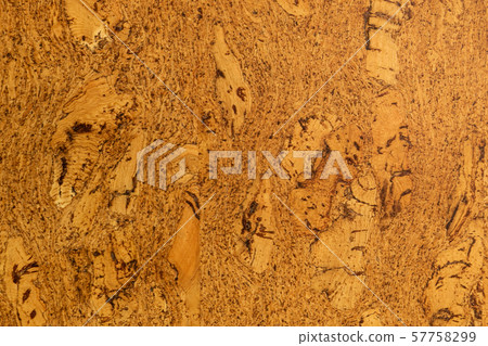Close-up of cork sound insulation lagging of carrot color for floors and walls Close-up of cork sound insulation lagging of carrot color for floors and walls 57758299