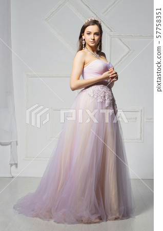 Cute young lady posing in the studio. Cute young lady posing in the studio. 57758351