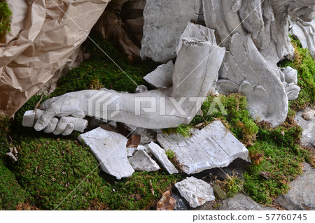 Broken stone statue detail of human hand 57760745