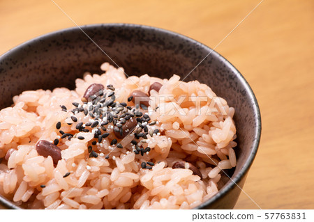 Red rice sprinkled with sesame salt. 57763831