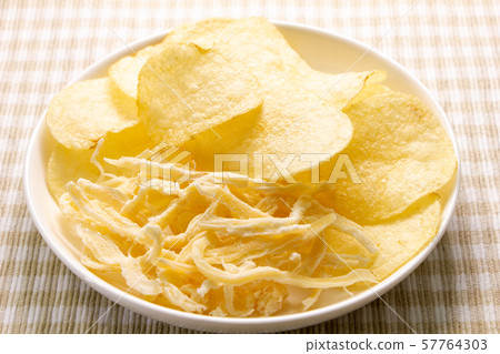 Assorted potato chips and squid squid. Snacks and snacks image. 57764303