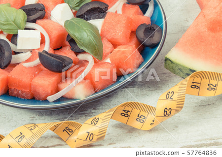 Fresh prepared salad of watermelon and feta cheese 57764836
