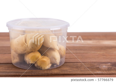Durian flesh or pulp packed into container for 57766879