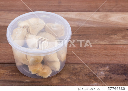 Durian flesh or pulp packed into container for 57766880