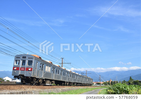 Nagano Electric Railway 8500 series train running in the mountains of Kitashiga 57768059