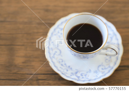White cup & saucer with coffee White cup & saucer with coffee 57770155