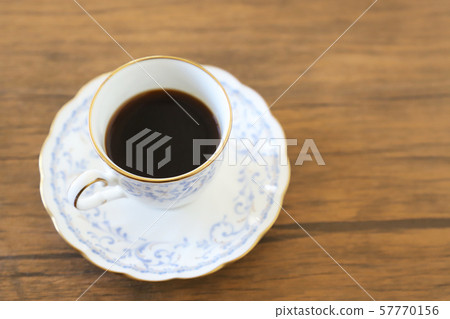 White cup & saucer with coffee White cup & saucer with coffee 57770156