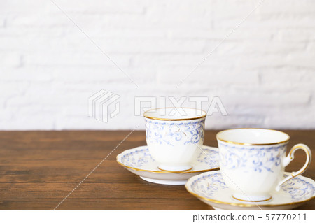 White cup & saucer with coffee White cup & saucer with coffee 57770211