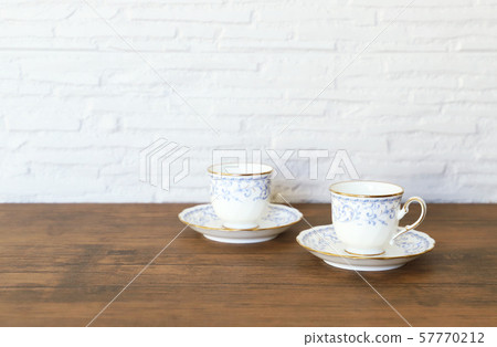 White cup & saucer with coffee White cup & saucer with coffee 57770212
