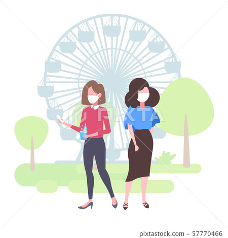 women in face masks using smartphones drinking water toxic air pollution industry smog polluted 57770466