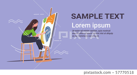 painter using paintbrush and palette woman artist sitting in front of easel art creativity hobby 57770518