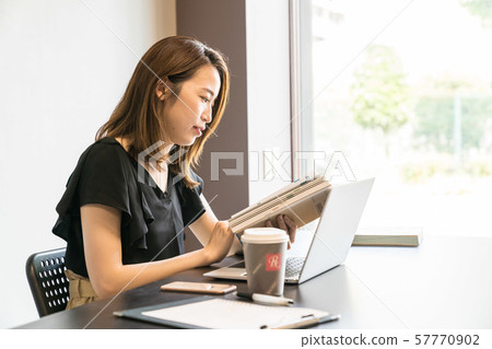 A young woman studying A young woman studying 57770902
