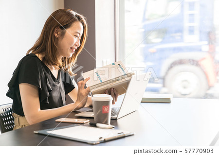 A young woman studying A young woman studying 57770903