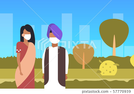 arab couple wearing face mask dirty waste toxic air pollution industry smog polluted environment 57770939