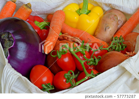 Colourful vegetables in shopping bag 57773287