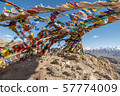 Colorful tibetan prayer flags on rock mountain in 57774009