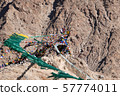 Colorful tibetan prayer flags on rock mountain in 57774011