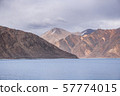 Pangong Lake with rocky mountains situated on the 57774015