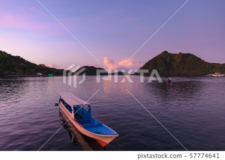 Sunset tropical sea wooden boats at Banda Islands. 57774641