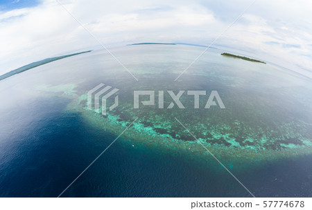Aerial view tropical beach island reef caribbean Aerial view tropical beach island reef caribbean 57774678