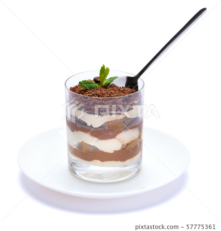 Classic tiramisu dessert in a glass cup on the plate on white background with clipping path 57775361