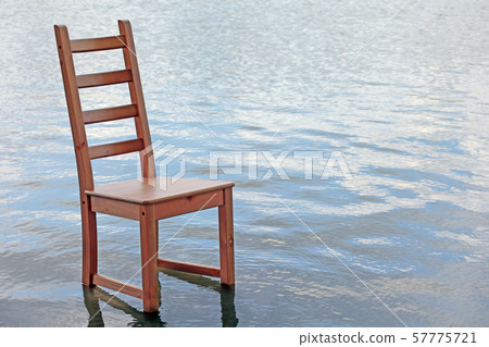 wooden chair wave river background  57775721