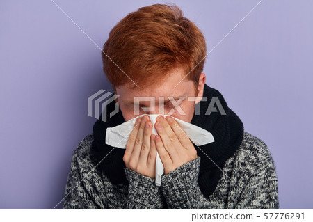 tired sleepy man has running nose tired sleepy man has running nose 57776291