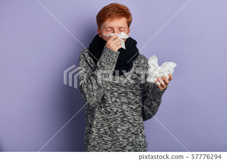 ill guy suffers from cold . close up portrait ill guy suffers from cold . close up portrait 57776294
