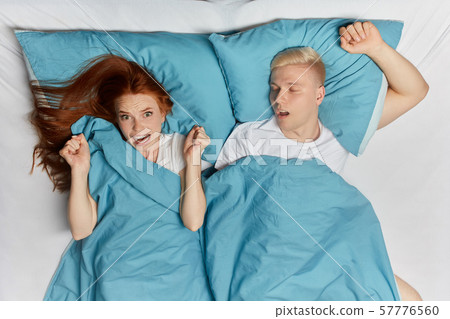 shouting young woman with clenched fists having mad expression shouting young woman with clenched fists having mad expression 57776560