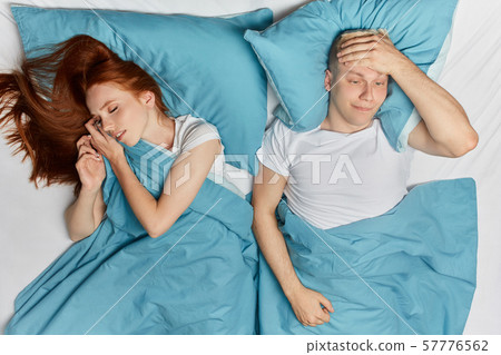 unhappy guy touching his head, thinking about how to ear money, business unhappy guy touching his head, thinking about how to ear money, business 57776562