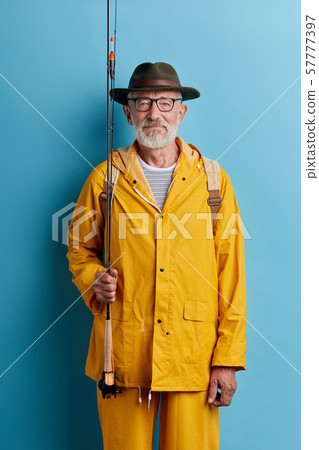 old handsome man is good at fishing old handsome man is good at fishing 57777397