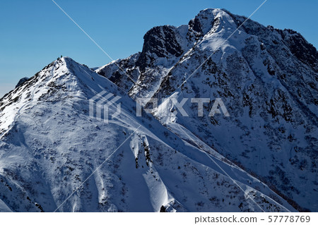 Yatsugatake mountain range, Amida-dake and Nakadake seen from Bunsaburo Yatsugatake mountain range, Amida-dake and Nakadake seen from Bunsaburo 57778769