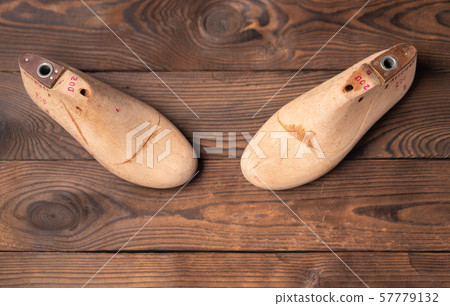 Leather samples for shoes and wooden shoe last on Leather samples for shoes and wooden shoe last on 57779132