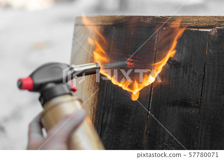 Professional carpenter using old traditional 57780071