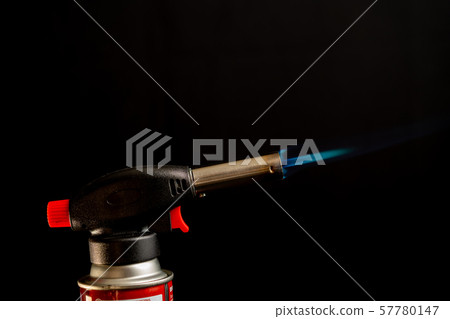 Flame gas burner dark background DIY tools Flame gas burner dark background DIY tools 57780147
